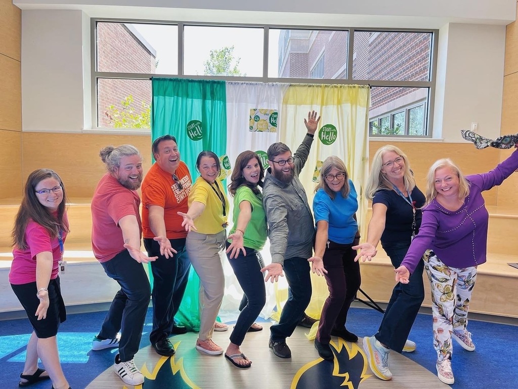 Teachers wearing rainbow colors